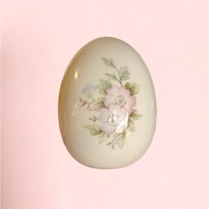 Vintage decorative ceramic egg with floral design